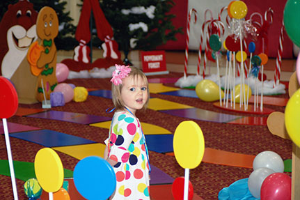 Little Girl Playing the Candy Land Life-Sized Game
